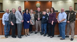 The Montgomery County Board of Supervisors is pictured here with Deputy Parks and the Linkous family.
