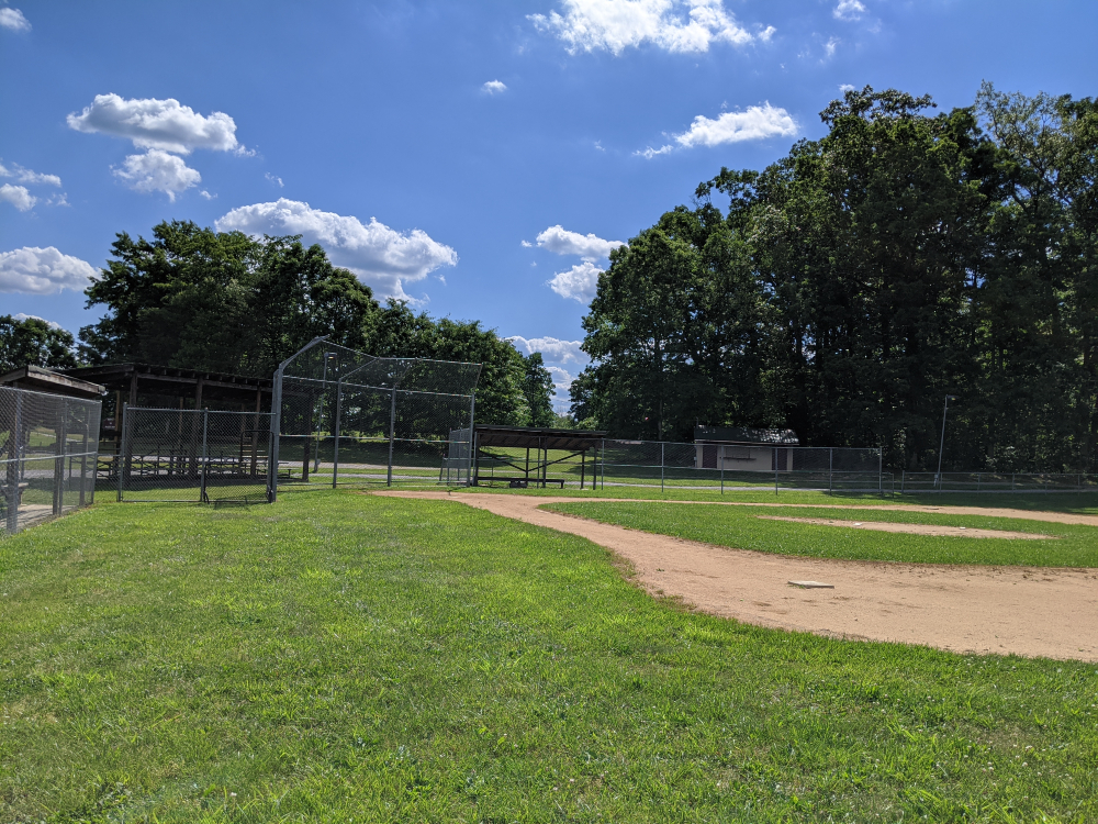 The baseball field at McCoy Park on a sunny summer day.
